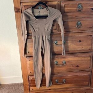 NWOT Free People Movement Tan Onesie Long Sleeved Size XS/S